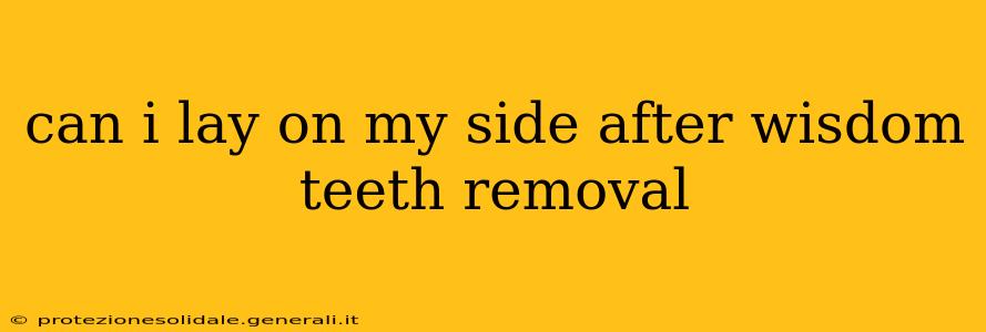 can i lay on my side after wisdom teeth removal