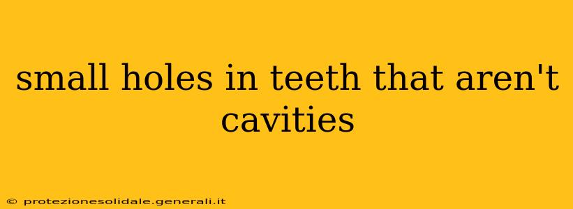 small holes in teeth that aren't cavities